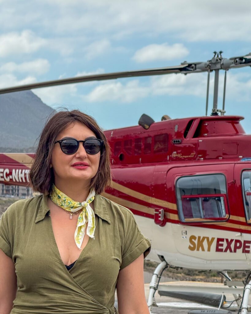 woman in the background of a helicopter a tenerife